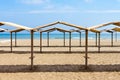 Rows of the palm leaf sun shades on the beach Royalty Free Stock Photo