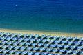 Rows of parasols on beach Royalty Free Stock Photo