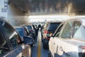 Rows of parked cars during transportation by ferry across the strait. Royalty Free Stock Photo