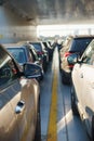 Rows of parked cars during transportation by ferry across the strait. Royalty Free Stock Photo