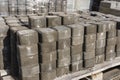 Rows of paving slabs on a pallet, Paving stones are prepared for paving streets. Construction of a pedestrian path Royalty Free Stock Photo