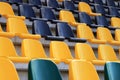 Rows of plastic black and yellow seats at a stadium Royalty Free Stock Photo