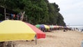 Rows of rainbow umbrellas on the beach Royalty Free Stock Photo