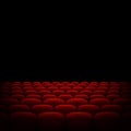 Rows of red cinema or theater seats isolated on black background. EPS 10 vector