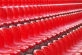 Rows of red empty stadium seats Royalty Free Stock Photo