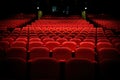 Rows of red generic theater seat