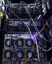 Rows of red network cables connected to router and switch hub in server room at internet data center Royalty Free Stock Photo