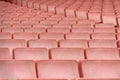 rows of red seats forming a repetitive pattern Royalty Free Stock Photo