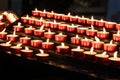Rows of Red Tealight Candles Burning Royalty Free Stock Photo