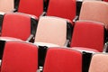 Rows of red theater seats in sn auditorium Royalty Free Stock Photo