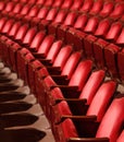 Rows of red velvet theater seats Royalty Free Stock Photo