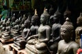 Rows of seated statue buddhas for sale amulet market in Bangkok