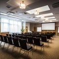 rows of seats in interior of modern empty conference hall for business meetings Royalty Free Stock Photo