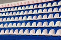 Rows of seats for spectators at sports stadium. Texture or back Royalty Free Stock Photo