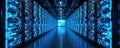 Rows of servers glow with blue lights in modern data center. Futuristic technology infrastructure offers high capacity and Royalty Free Stock Photo