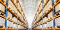 Rows of shelves with boxes in modern warehouse Royalty Free Stock Photo