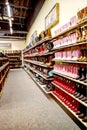 Rows of cowboy boots in a retail store.