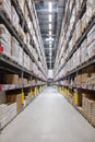 Rows of shelves with goods boxes in modern industry warehouse store at factory warehouse storage Royalty Free Stock Photo