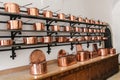 Rows of shiny copper saucepans in the Neuschwanstein castle in Bavaria