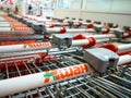 Rows of shopping carts in the Auchan supermarket Royalty Free Stock Photo