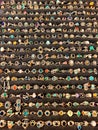 Rows of silver and gold semi precious stone rings Royalty Free Stock Photo