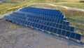 Rows of solar panels mounted on concrete piles