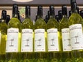 Rows of styrian muskateller white wine bottles lined up on display Royalty Free Stock Photo