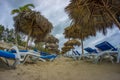 Rows of sun beds at the beautiful beach of Varadero in Cuba at rainy and stormy day