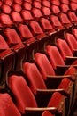 Rows of theater seats in an old vaudeville style theater. Royalty Free Stock Photo