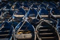 Rows of traditional blue fishing boats in the harbor of the city of Essaouira, in the Atlantic Coast of Morocco