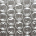 Rows of transparent, spherical bubbles form a pattern typical of bubble wrap Royalty Free Stock Photo