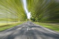 Rows of trees along the road in motion blur Royalty Free Stock Photo
