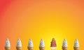 Rows of Two Types of Soft Serve Ice Cream Cones on Orange Background Royalty Free Stock Photo