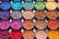 rows of unpressed colorful eyeshadow pellets