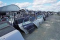 Rows of used car doors in an open warehouse for disassembly. Royalty Free Stock Photo