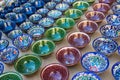 Rows of uzbek cups with traditional uzbekistan ornament, Bukhara