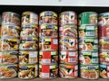 Rows of variety canned food product on shelves Royalty Free Stock Photo