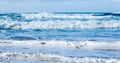 Rows of waves coming to shore Royalty Free Stock Photo