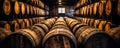 Rows of Whiskey Bourbon Scotch Barrels in Aging Warehouse Royalty Free Stock Photo