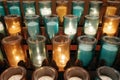 Rows of White, Blue and Gold Votive Candles