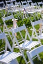 Rows of white chairs arranged for a wedding ceremony Royalty Free Stock Photo