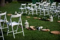 Rows of white chairs arranged for a wedding ceremony Royalty Free Stock Photo