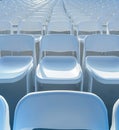 Rows of white chairs in an empty auditorium Royalty Free Stock Photo
