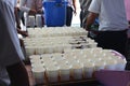 Rows of White Disposable Cups Ready for Serving Drinks at an Event Royalty Free Stock Photo