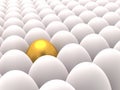 Rows of white eggs with one golden egg among Royalty Free Stock Photo