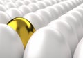 Rows of white eggs with one golden egg among Royalty Free Stock Photo