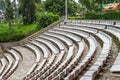 Rows of empty outdoor stadium seats and stairs Royalty Free Stock Photo