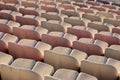 Rows of white plastic seats at a stadium Royalty Free Stock Photo