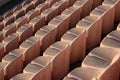 Rows of white plastic seats at a stadium Royalty Free Stock Photo