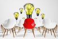 Rows of white and red chairs, light bulb Royalty Free Stock Photo
